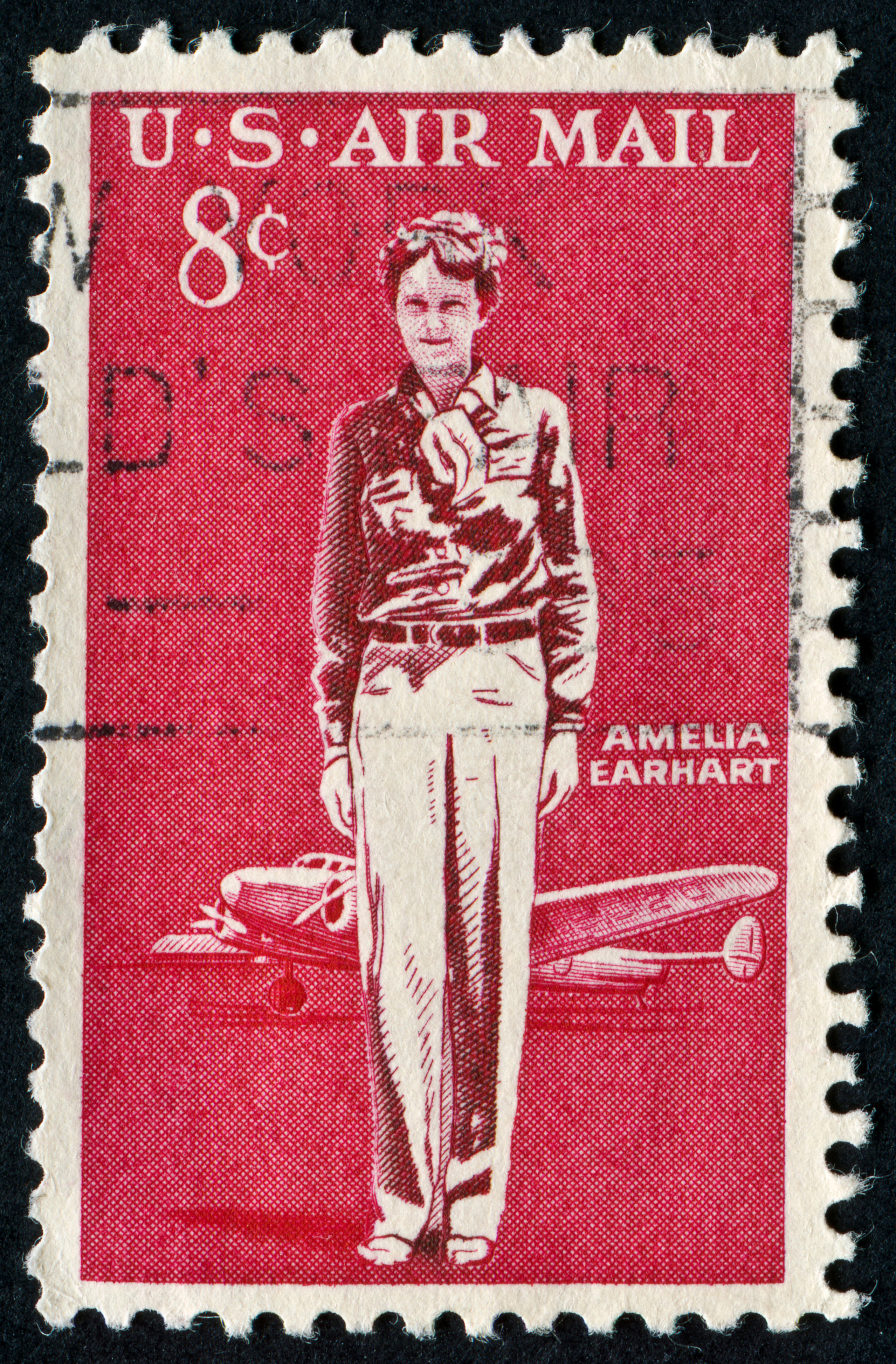Richmond, Virginia, USA - February 15th, 2012: Cancelled Eight Cent Stamp From The United States Featuring Amelia Earhart. She Was The First Woman To Fly Solo Across The Atlantic Ocean.
