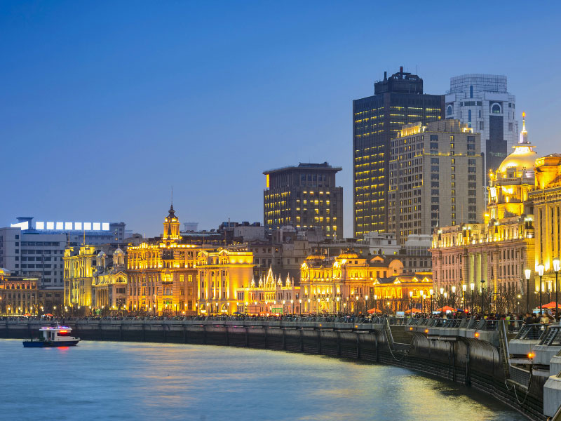 Shanghai at night. Located in The Bund (Waitan). It is a waterfront area in central Shanghai, one of the most famous tourist destinations in Shanghai, China