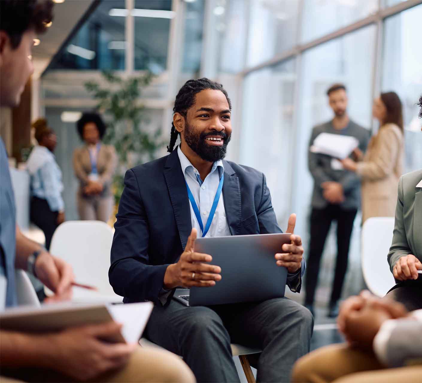 Man in meeting event with laptop
